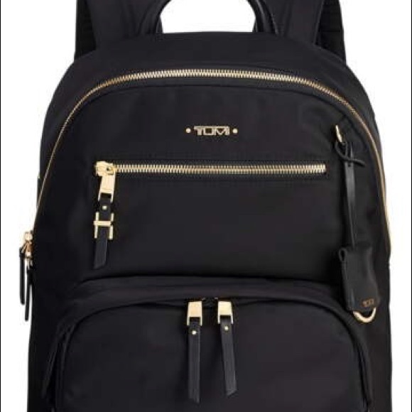 tumi black and gold backpack